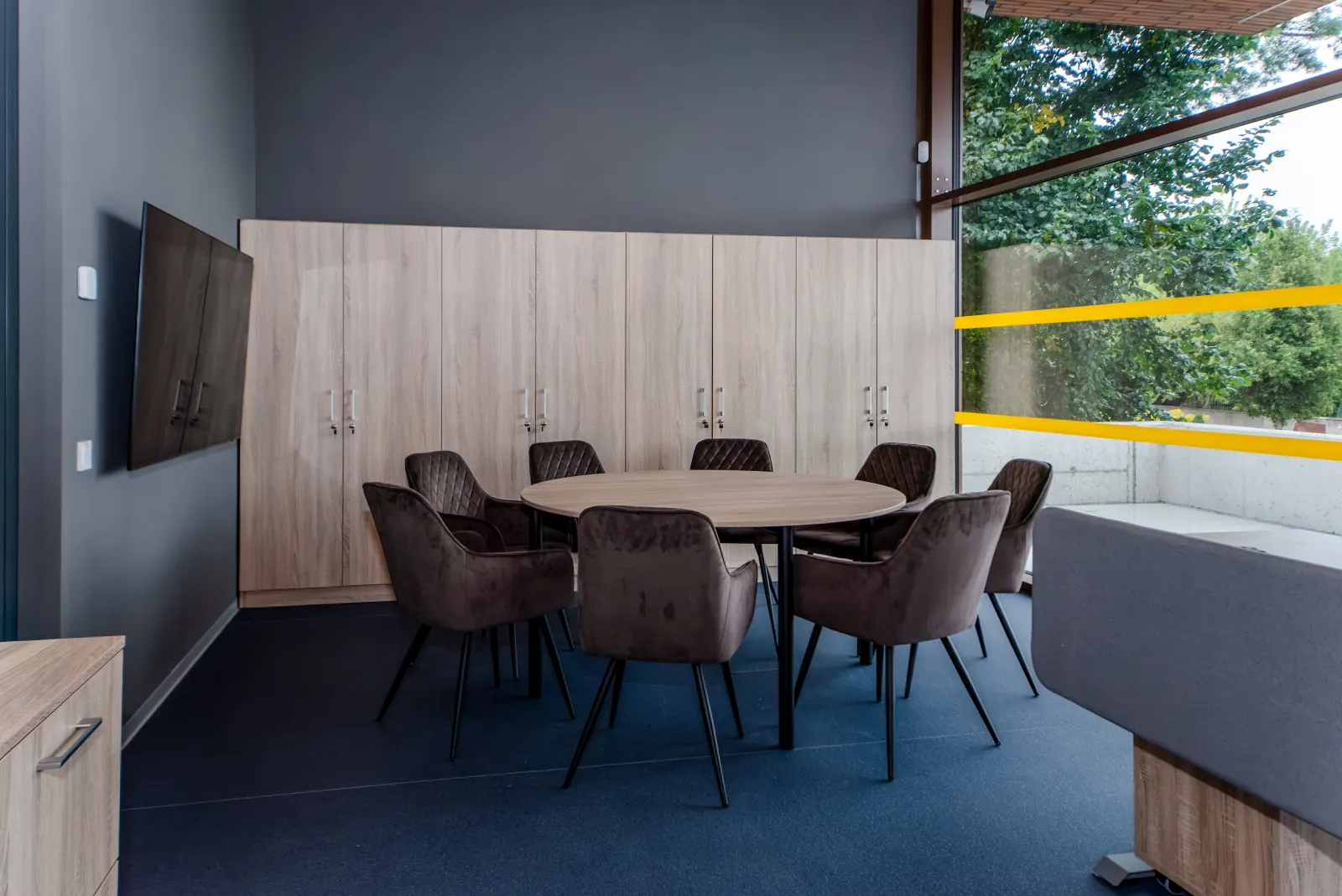 Meeting room with storage wall